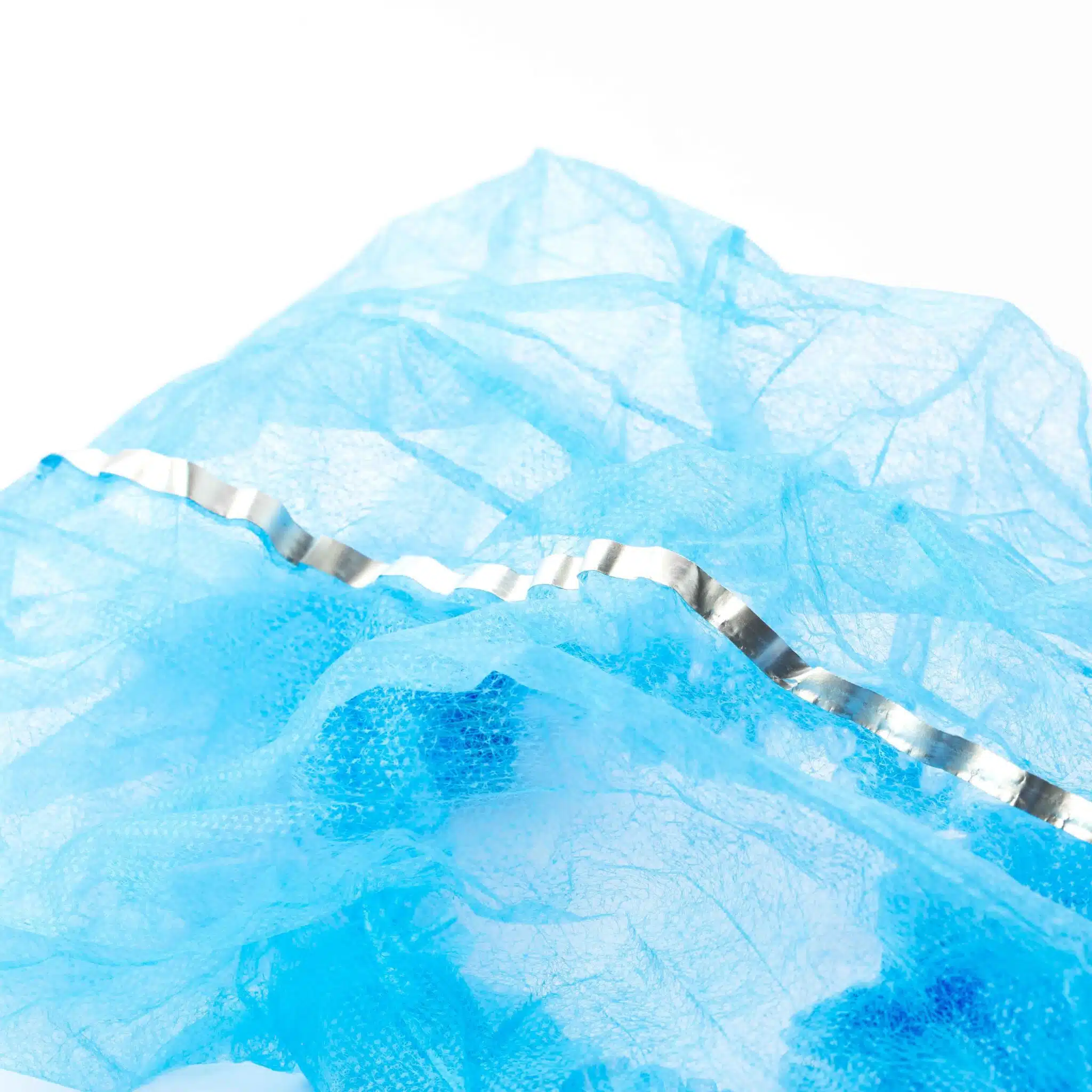 Disposable non woven detectable clip cap with metal strip - Imagem 2