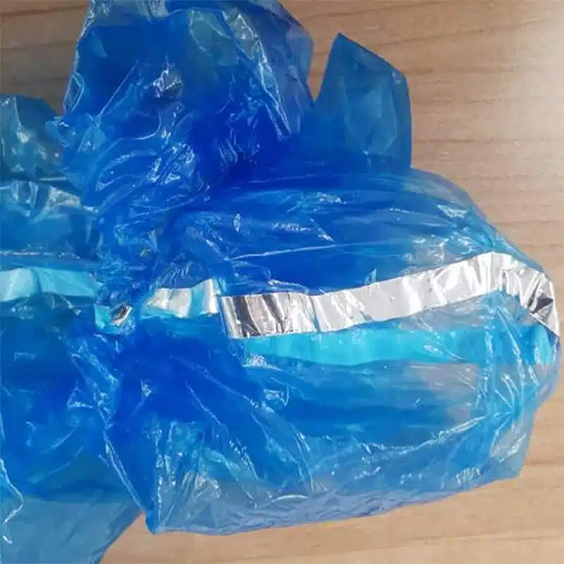 Disposable arm sleeve cover with mental/detectable strip - Imagem 3