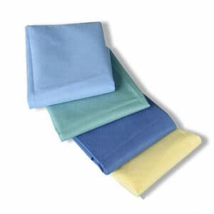 4 folded disposable sheets of different colors