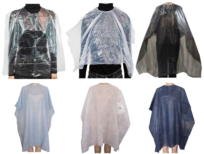 Assorted salon hairdressing capes on white background.