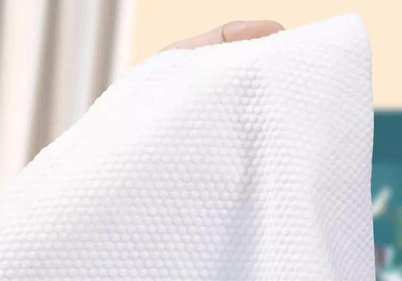 Close-up of textured white memory foam pillow.