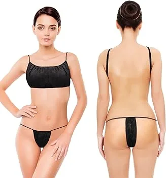 Woman modeling front and back view of black lingerie.