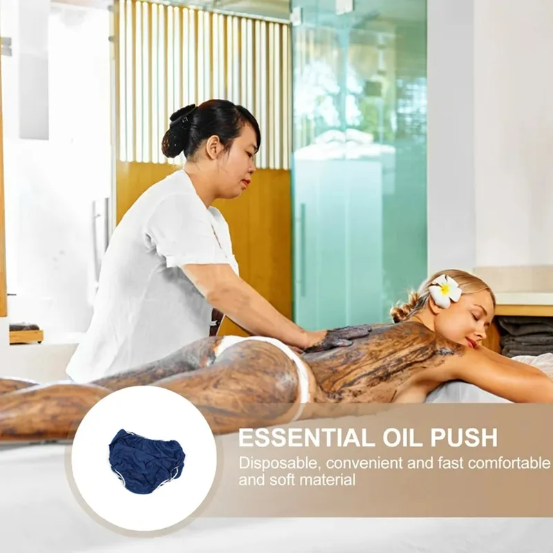 Woman receiving spa essential oil massage treatment.