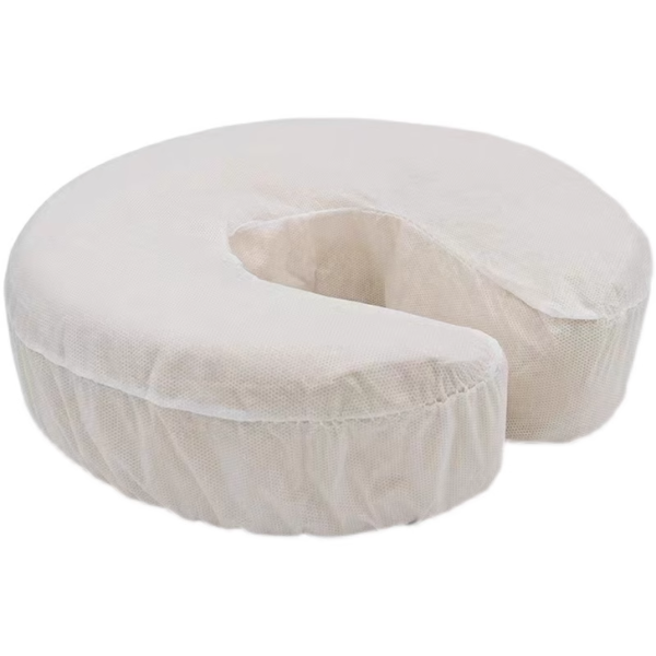 White orthopedic memory foam donut cushion.