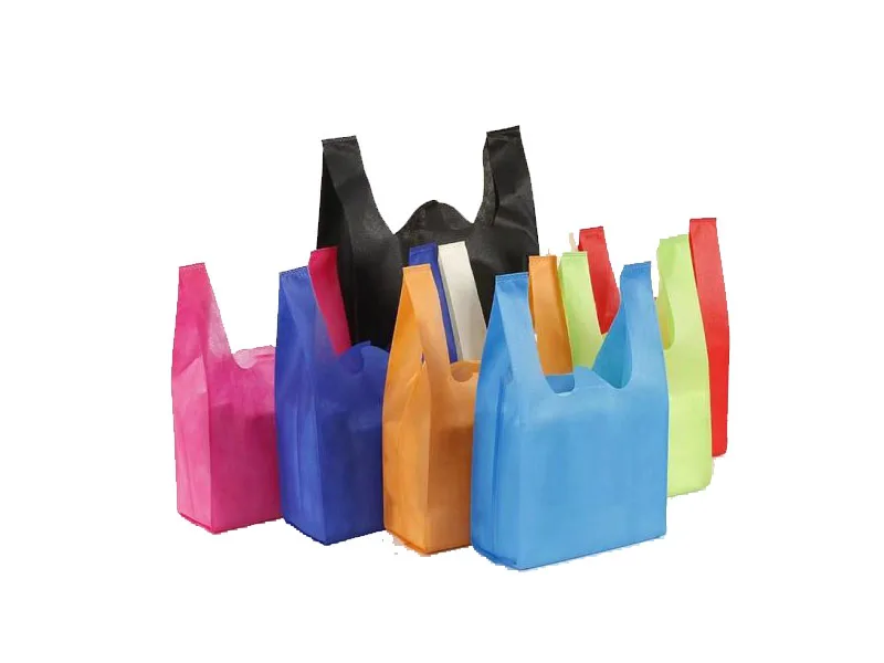 Colorful reusable shopping bags isolated on white background.