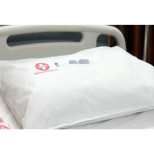 Hospital bed with white pillow