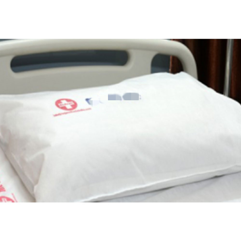 Hospital bed with white pillow