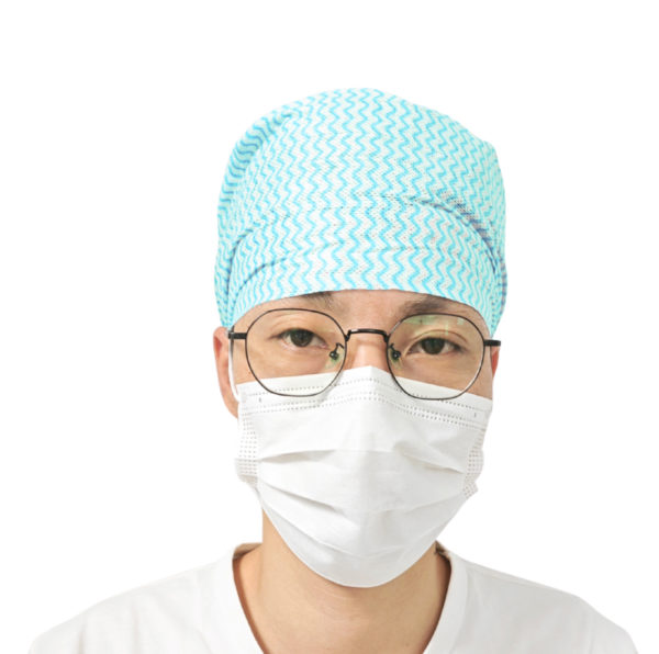 Healthcare worker in mask and cap