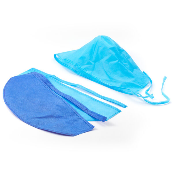 Blue surgical caps and masks on white background