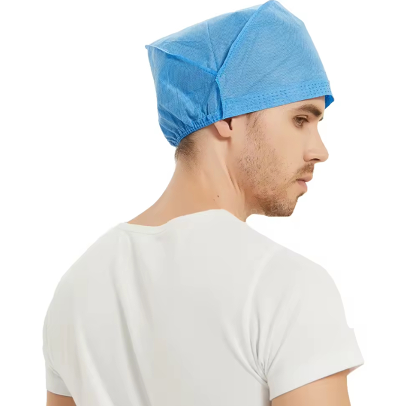 Man wearing blue surgical cap