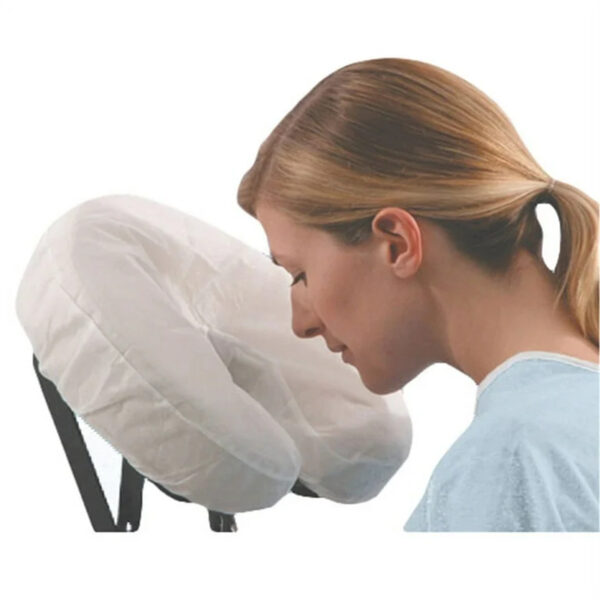 Woman using a massage chair face cradle.