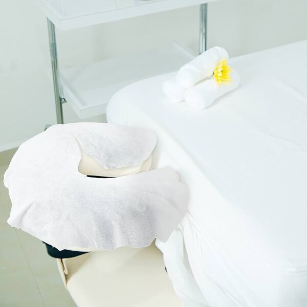 Massage table with towels in spa