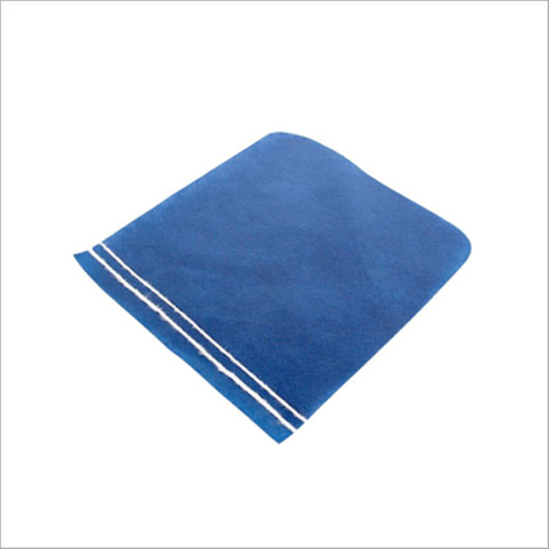 Blue exfoliating shower glove