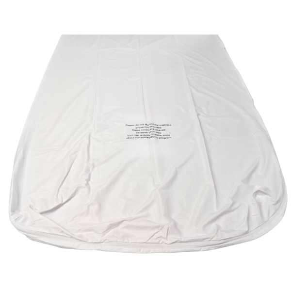 White mattress cover with sustainability message