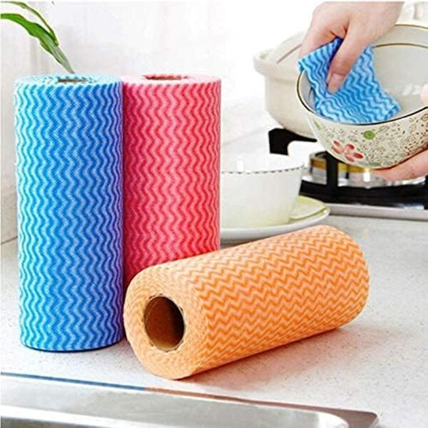 Colorful cleaning cloth rolls near a dishwashing sink.