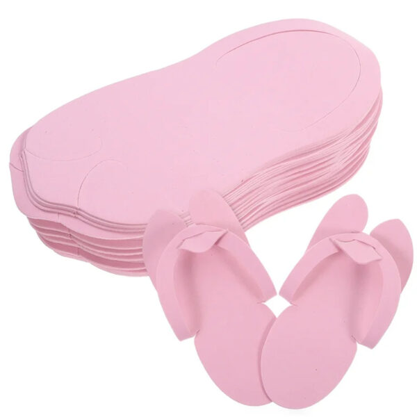 Stack of pink disposable slippers