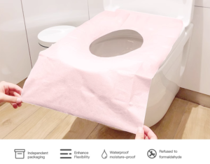 Disposable toilet seat cover in use.