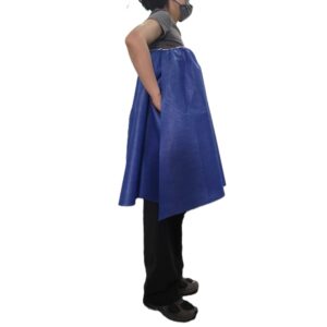 Person wearing blue protective apron, profile view.